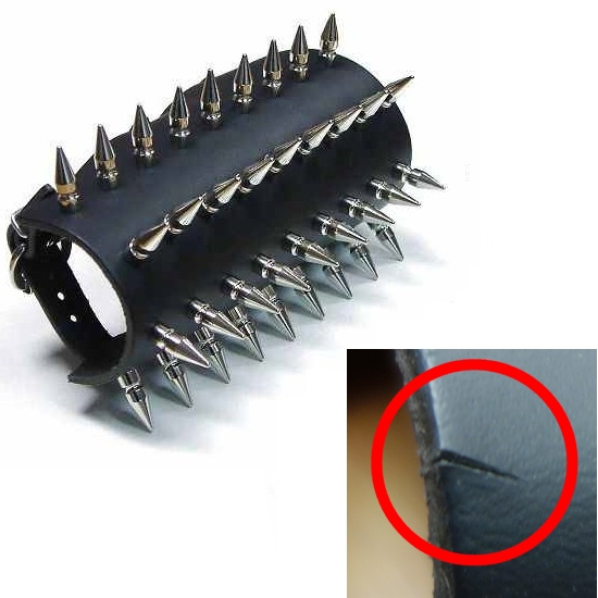 Bild 1 von Nietenarmstulpe mit Spikenieten 25mm, Armstulpe mit winzig kleiner Fehlerstelle (siehe Abbildung)