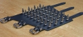 Bild 4 von Nietenarmstulpe mit Spikenieten 25mm - bauchige Nietenform, Anordnung 4x9